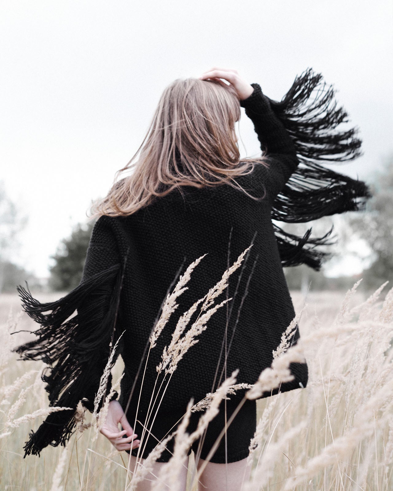 Fringe Turtleneck